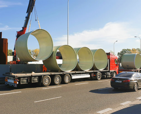 Amiblu Flowtite pipes on truck unloading for Burakowski collector