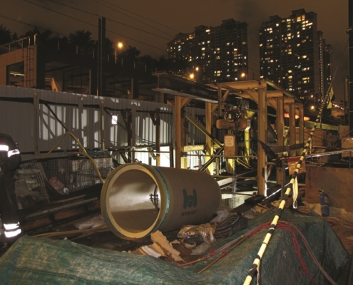 Trenchless installation of Hobas protection pipes beneath rail tracks in Hong Kong
